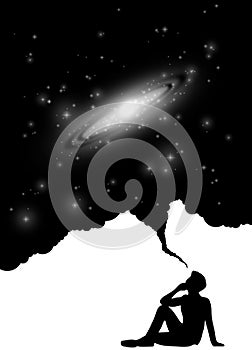 Silhouette of man with spiral galaxy and stars