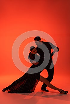 Silhouette of man in suit dancing