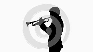 Silhouette Man in suit standing playing trumpet.