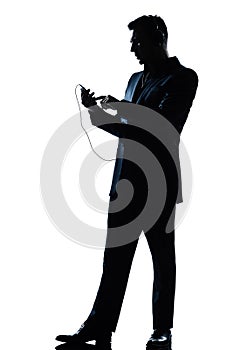 Silhouette man text telephone listening to