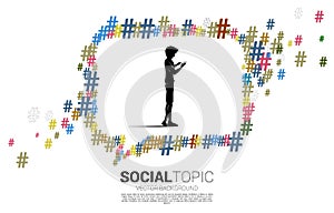 Silhouette of man use mobile phone with Speech bubble from small hash flow background .concept for social media topic and news