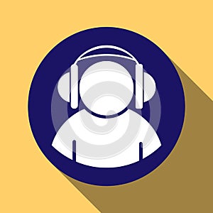 Silhouette of a man wearing headphones on a round blue button, l