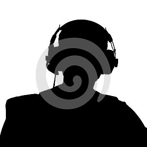 Silhouette of a man wearing spy headphones