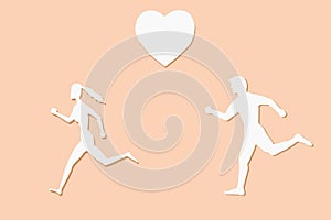 Silhouette man and woman running after each other. The concept of love, relationships, and sports