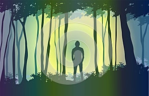 Silhouette of man in the woods