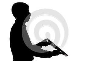 Silhouette of a man working in the company and brought the report in a folder
