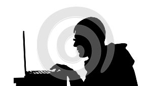 Silhouette of a man working on a laptop. Black and white mask