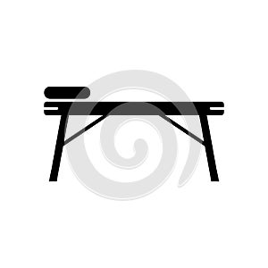 Silhouette Massage table. Outline icon of spa bed with head pillow. Black illustration of professional folding equipment for