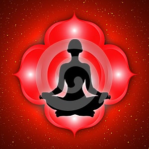 Silhouette of meditating person with root chakra symbol background