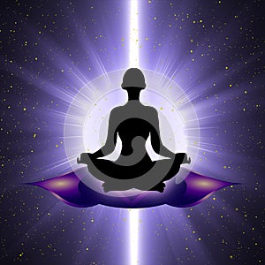 Silhouette of meditating person with third eye chakra symbol background