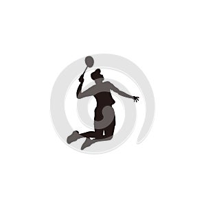 silhouette of men badminton player jumping smash at court - silhouette of sport men are playing badminton attack with jumping smas