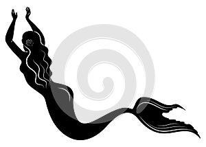 Silhouette of a mermaid. Beautiful girl is floating in the water. The lady is young and slender. Fantastic image of a fairy tale.