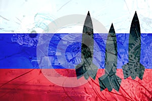 Silhouette of missiles on a background of the flag of Russia. Nuclear weapon  danger concept