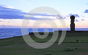 Silhouette of Moai with Pukao Hat of Ahu Ko Te Riku Ceremonial Platform, with Pacific Ocean in the Backdrop, Easter Island
