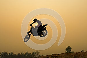 Silhouette motocross jump