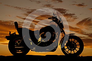 Silhouette motorcycle side sunset photo