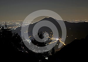 silhouette of Mount Summano near the city of Vicenza in Italy wi