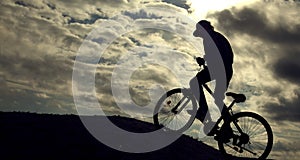 Silhouette of Mountain bike.Sport and healthy life.Extreme sports.Mountain bicycle and man.Life style outdoor extreme sport