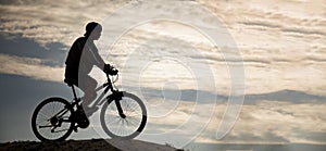 Silhouette of Mountain bike.Sport and healthy life.Extreme sports.Mountain bicycle and man.Life style outdoor extreme sport