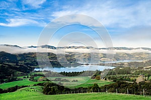 Silhouette of mountains in the misty morning. View of the mountains in early winter. Beautiful nature landscape. Bank Peninsula,