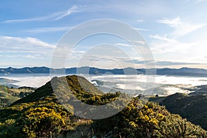 Silhouette of mountains in the misty morning. View of the mountains in early winter. Beautiful nature landscape. Bank Peninsula,