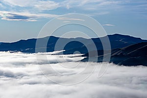 Silhouette of mountains in the misty morning. View of the mountains in early winter. Beautiful nature landscape. Bank Peninsula,