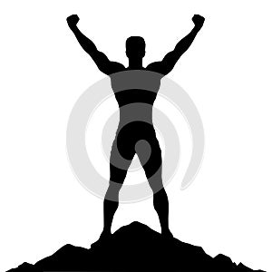 Silhouette of Muscle man standing atop a mountain, raising his arms as a symbol of victory