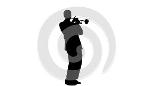 Silhouette. Musician playing a merry tune on a pipe