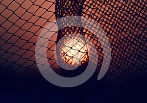 Silhouette nylon nets with sunlight background photo