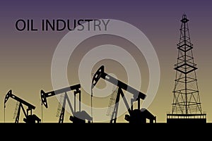 Silhouette of oil or gas drilling rigs on a sunset background.