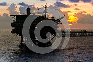 Silhouette of an oil production platform at Terengganu oil field