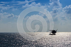 Silhouette of oil production platforms at Terengganu oil field