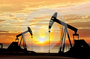 Silhouette of oil pumps