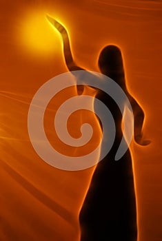 Silhouette of an oriental dancer photo
