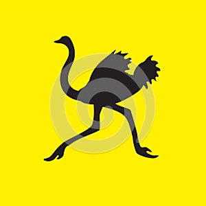 The silhouette of an ostrich bird flees on a yellow isolated background. Vector image