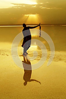 A silhouette over the salt lake in the Danakil depression