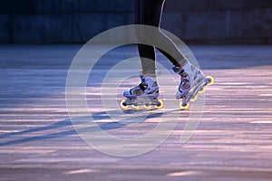 Silhouette pairs of legs on roller skates