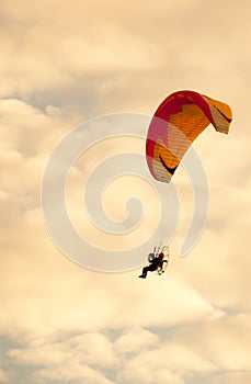 Silhouette of para motor glider