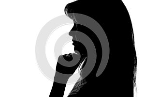Silhouette of a pensive woman