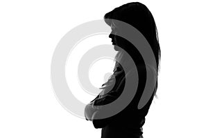 Silhouette of a pensive woman on a white background