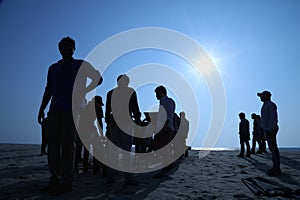silhouette of people at Beach
