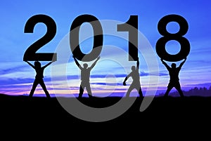 Silhouette people happy for 2018 new year.