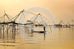 Silhouette people standing on boat,Patthalung,Thailand