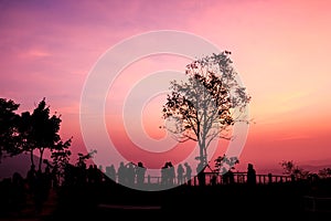 Silhouette people on sunset view point
