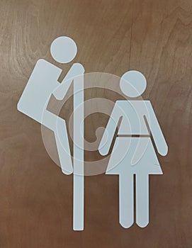 Silhouette of people in the toilet. A man spies on a woman. Funny illustration in the toilet