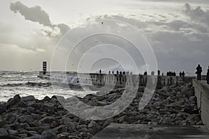 People watching storm