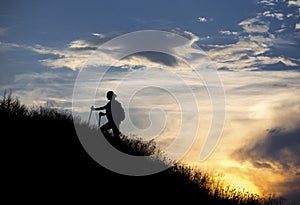 Silhouette of person heavy walking toward the