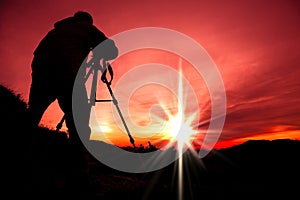 Silhouette of photographer