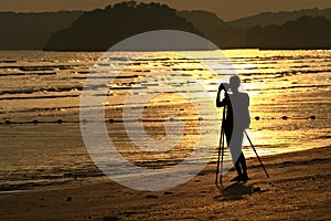 Silhouette of a photographer at Ao Nang, Krabi