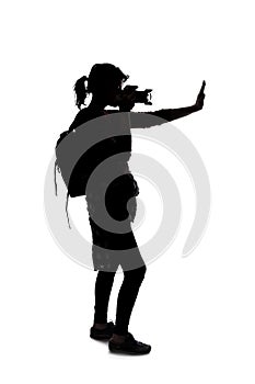 Silhouette of a Photographer With Stop Gesture